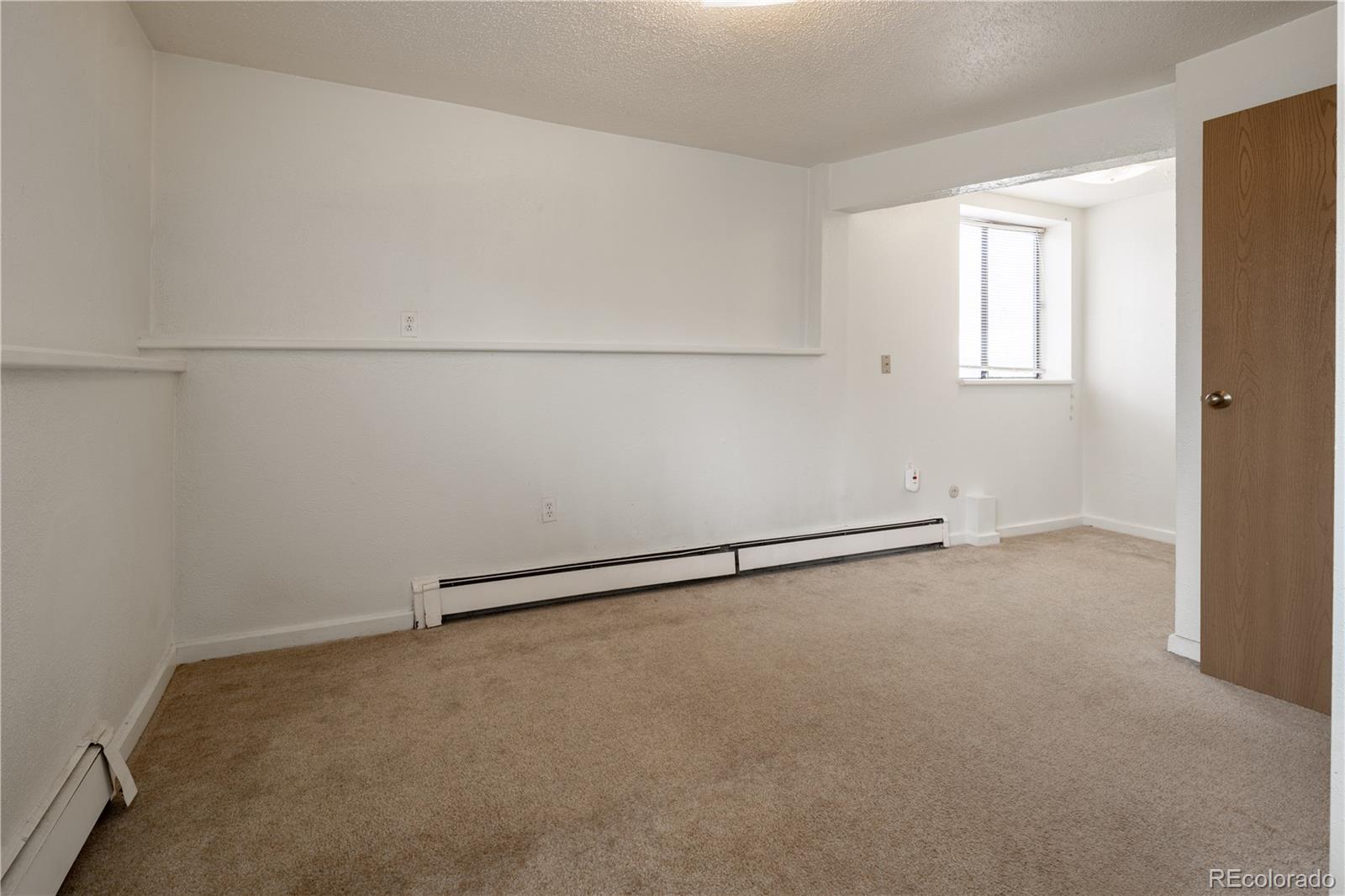 3413 Wadsworth Boulevard Wheat Ridge, CO 80033 - Photo 22 of 25 a view of an empty room