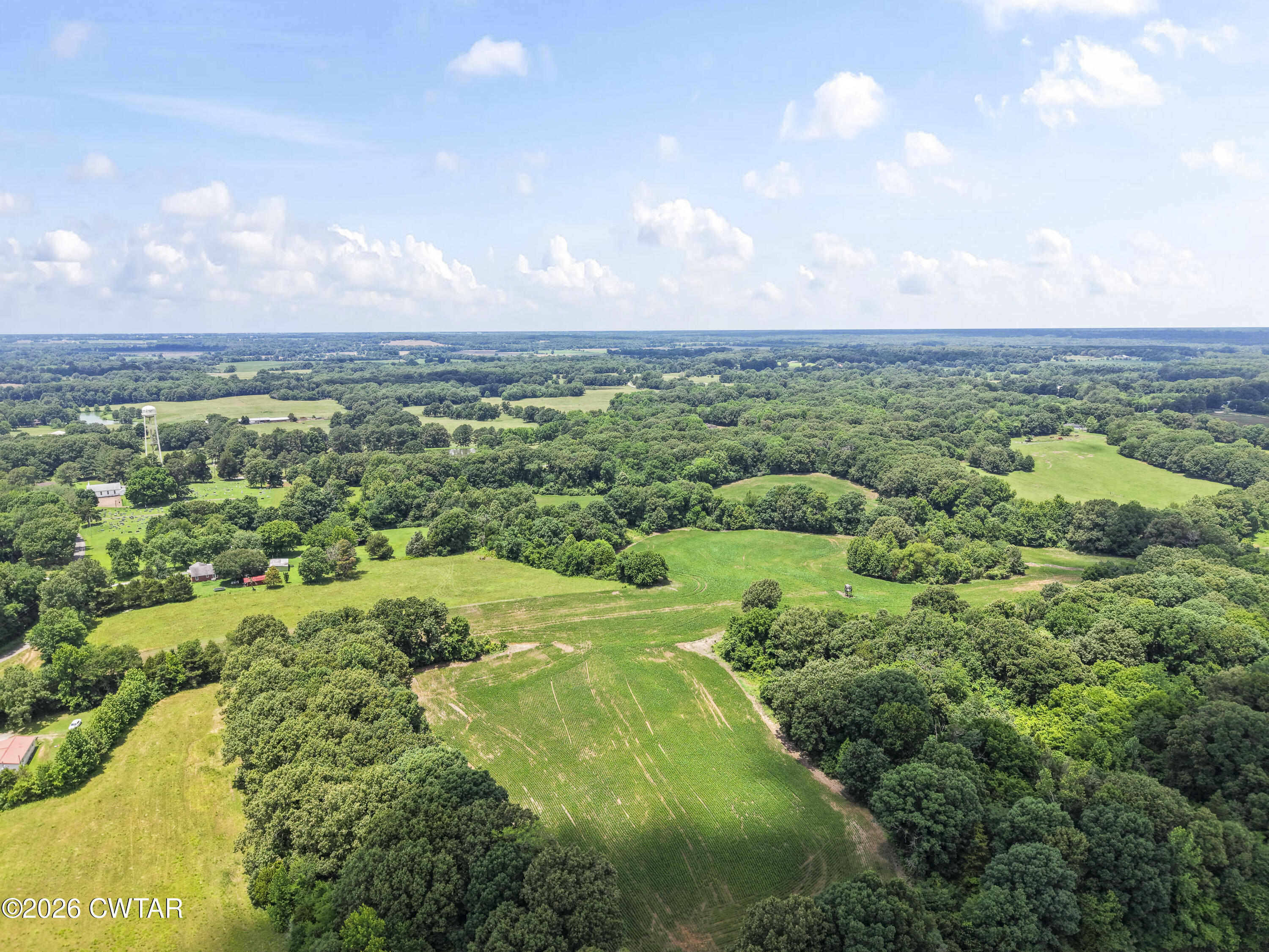 0 Aubrey Ferguson Road Gadsden, TN 38337 - Photo 9 of 15 a view of a city with lush green forest