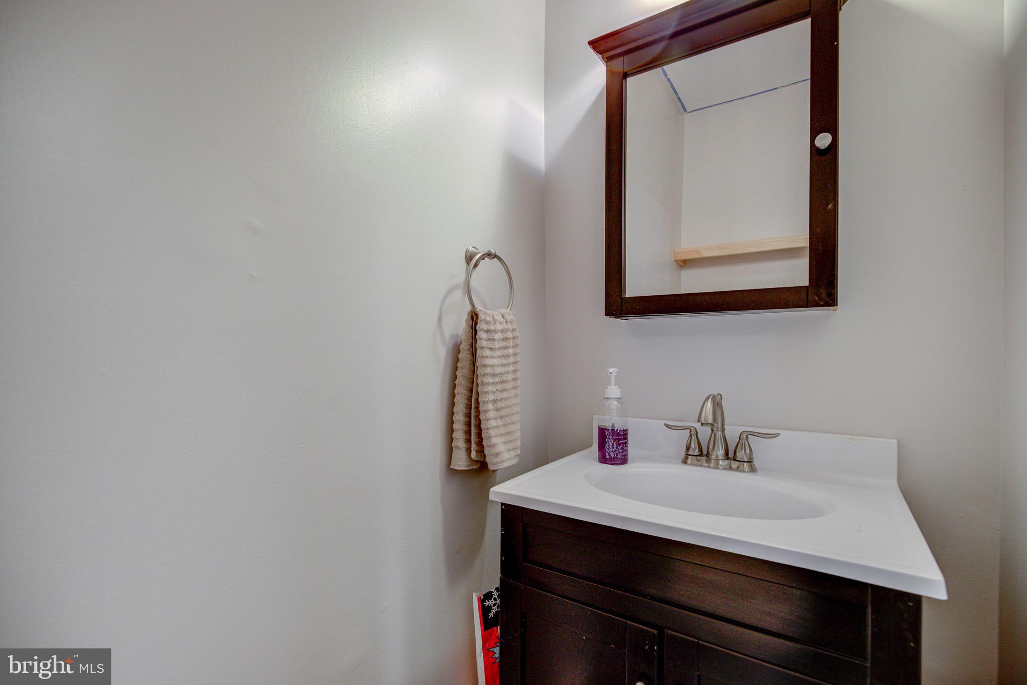 11958 Heathcote Court Reston, VA 20191 - Photo 16 of 42 Updated half bath on main level