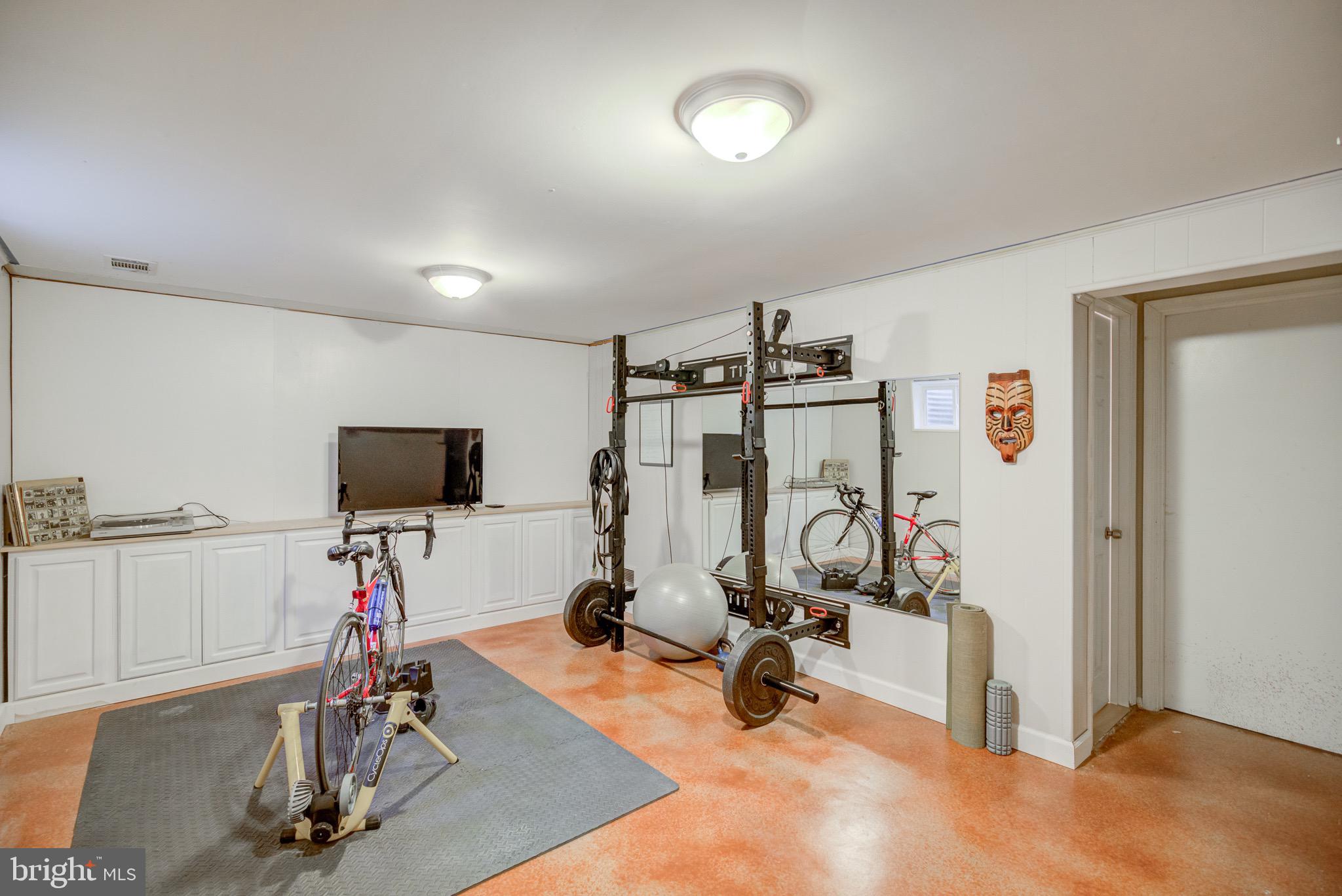 11958 Heathcote Court Reston, VA 20191 - Photo 25 of 42 lower level with built in shelves