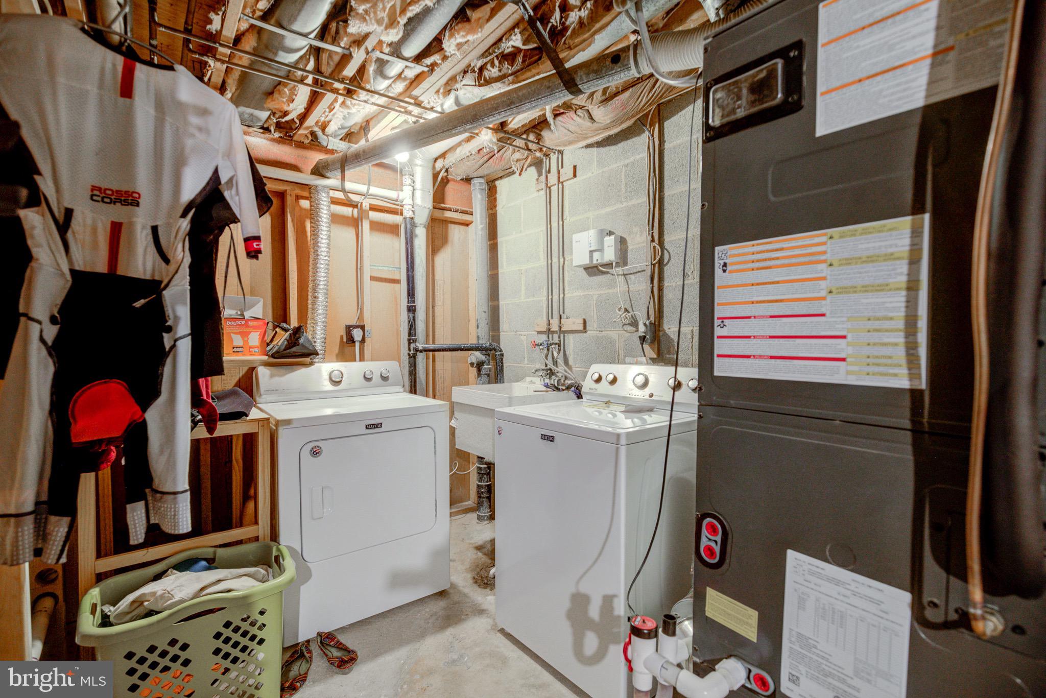 11958 Heathcote Court Reston, VA 20191 - Photo 28 of 42 lower level full size washer/dryer