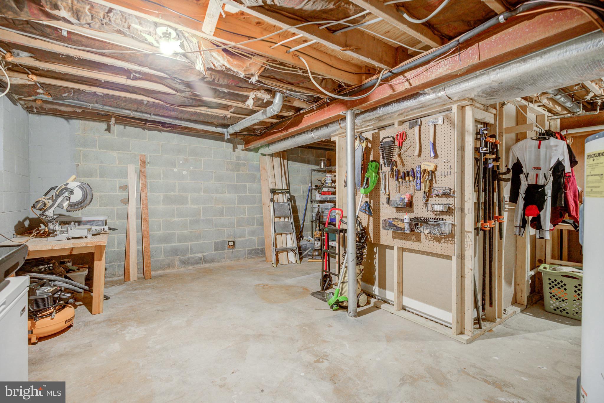 11958 Heathcote Court Reston, VA 20191 - Photo 30 of 42 storage/hobby-woodworking area