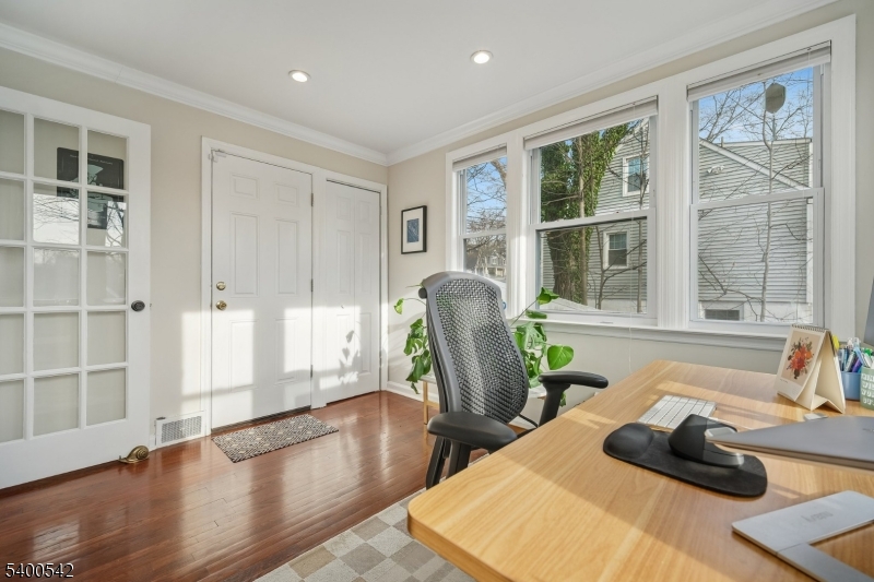 29 Washington Avenue Morristown, NJ 07960 - Photo 14 of 31 a room with furniture and a potted plant