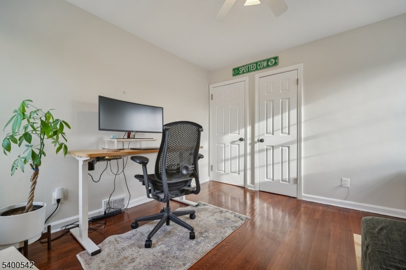 29 Washington Avenue Morristown, NJ 07960 - Photo 19 of 31 a view of a workspace with furniture and a window