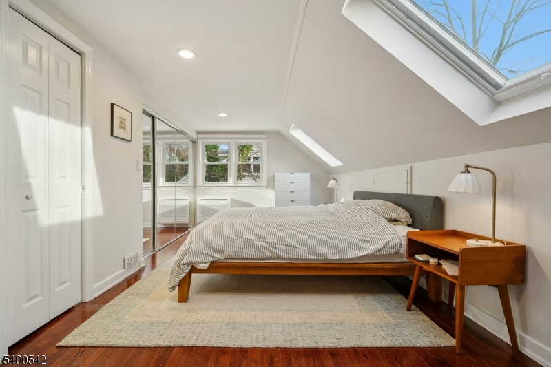 29 Washington Avenue Morristown, NJ 07960 - Photo 22 of 31 a bed room with a bed and a window