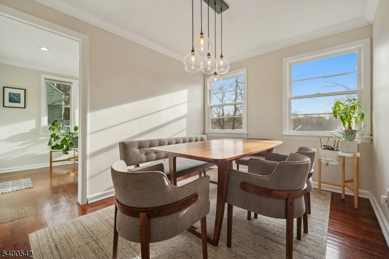 29 Washington Avenue Morristown, NJ 07960 - Photo 8 of 31 a view of a dining room with furniture window and wooden floor