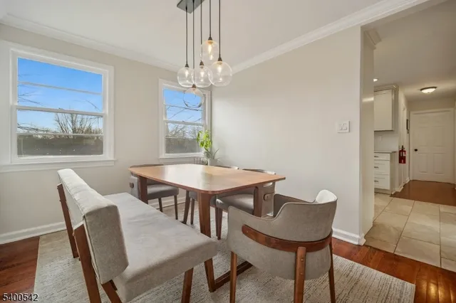 a kitchen with stainless steel appliances granite countertop a refrigerator sink and cabinets