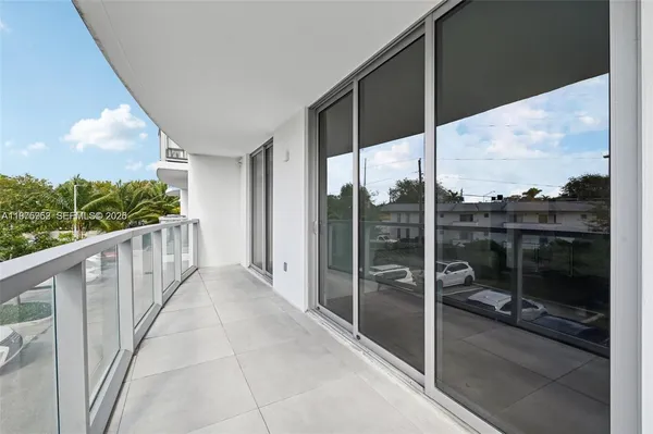 a view of a balcony with chair
