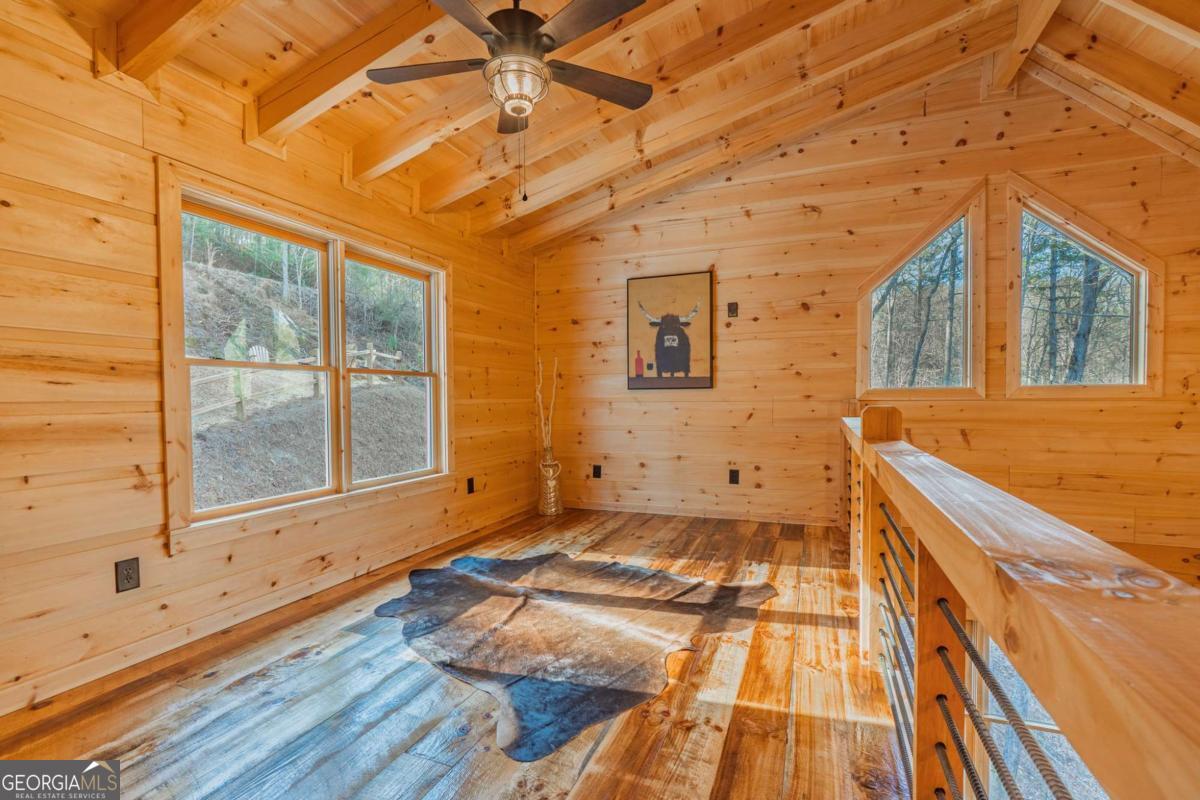 138 Rhondas Way, Unit 106 Ellijay, GA 30540 - Photo 12 of 26 a view of a backyard of a house