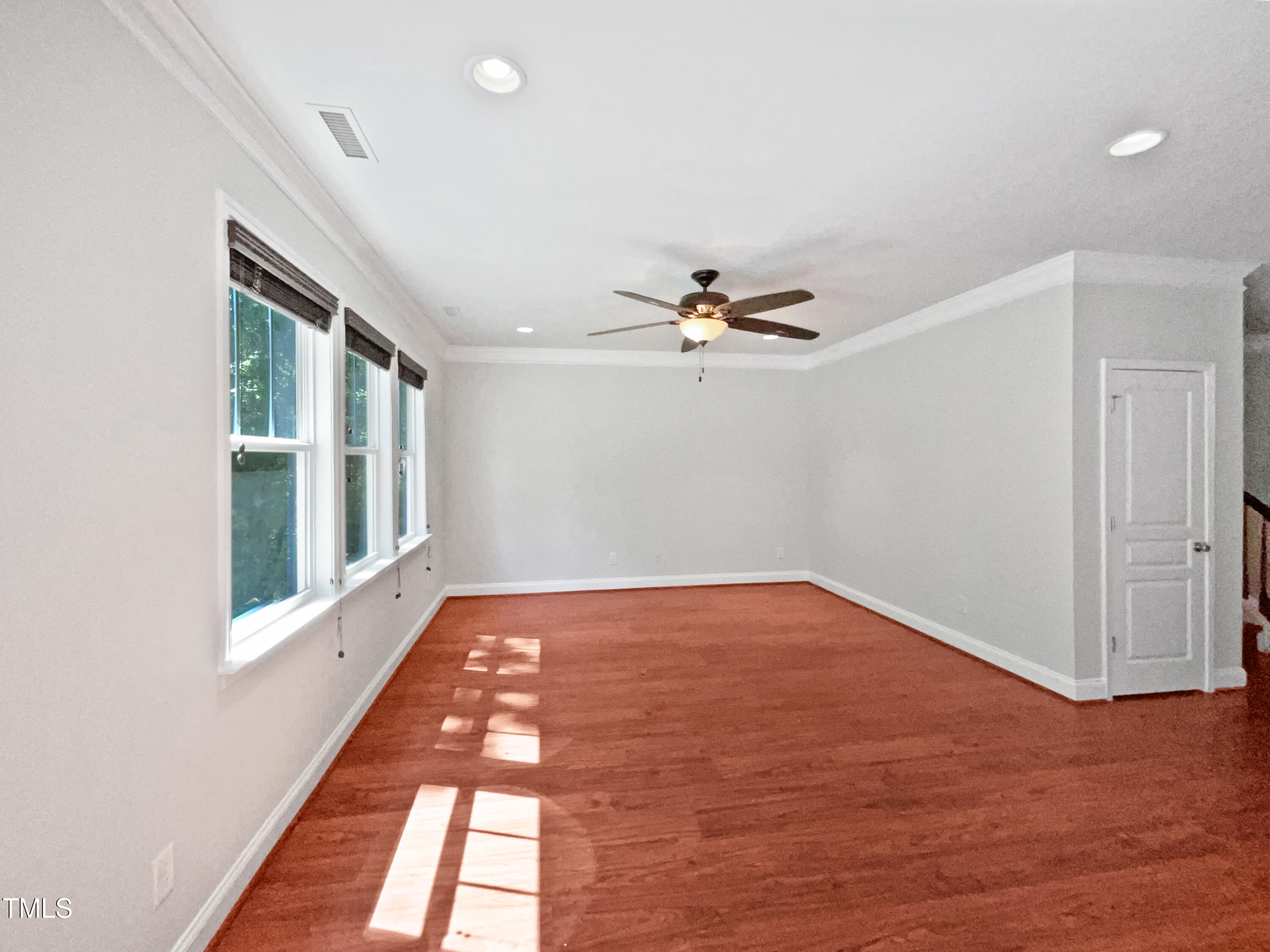 148 Daneborg Road Durham, NC 27703 - Photo 3 of 21 a view of an empty room with a window