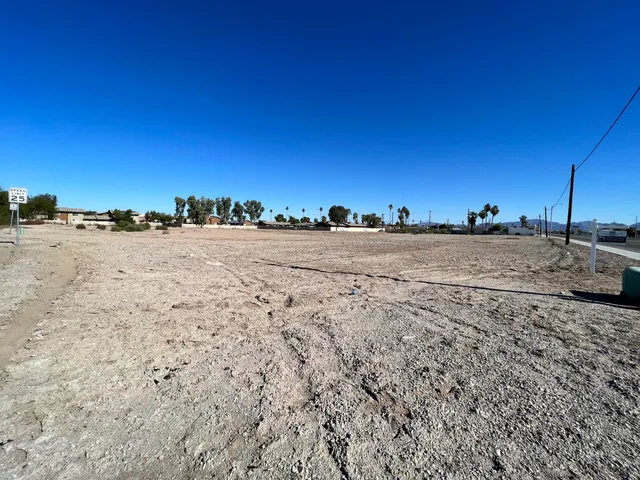 a view of a beach with a city view