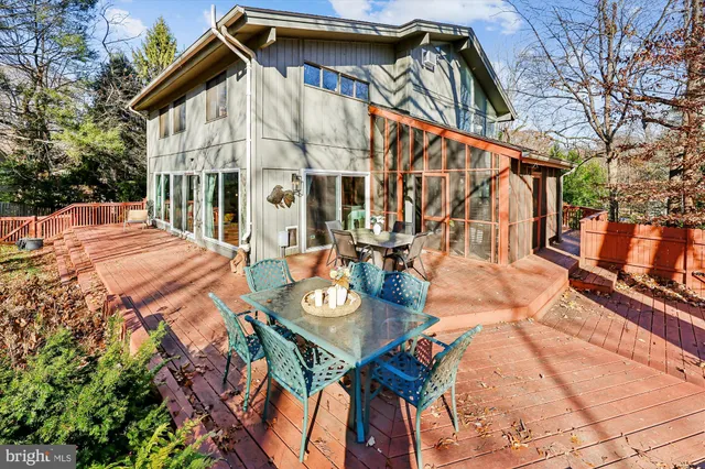 a view of an outdoor sitting area with furniture