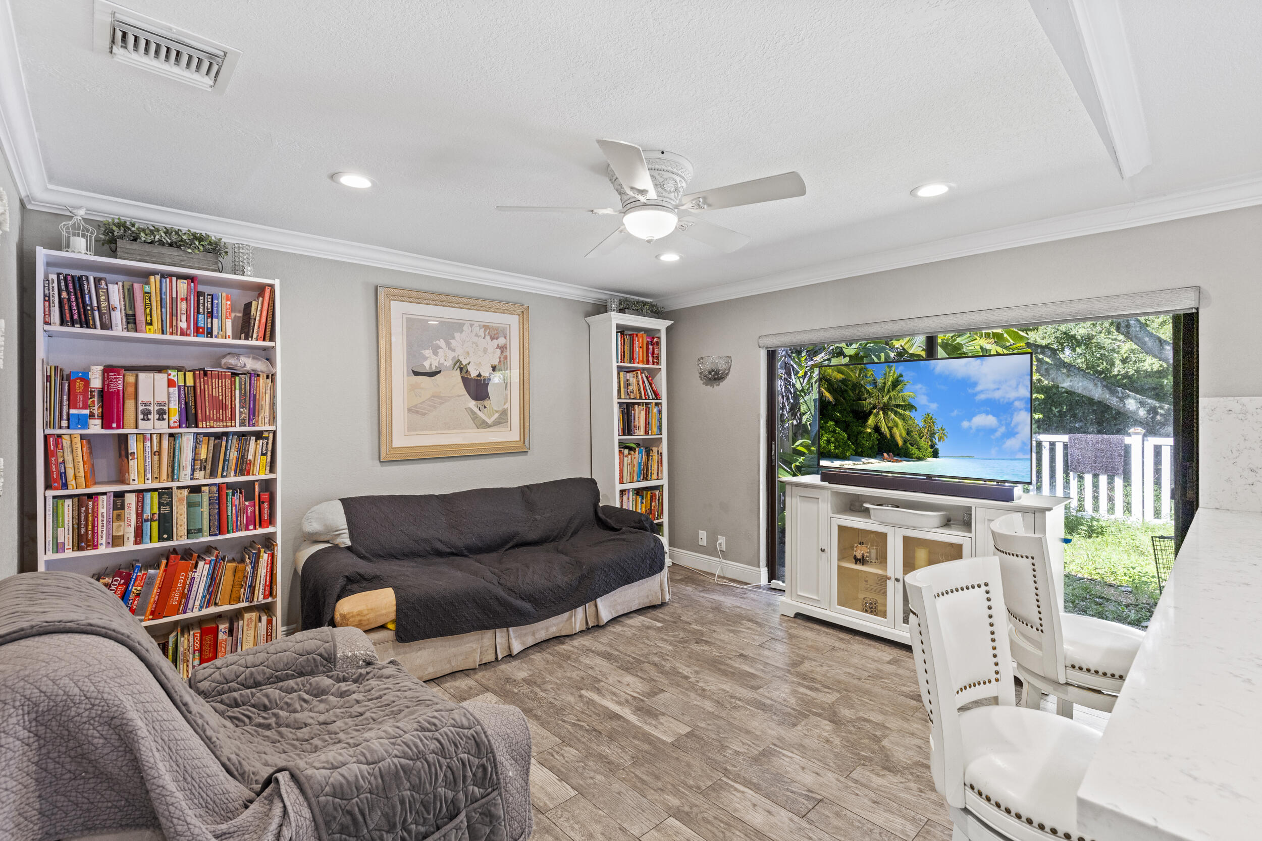 21665 Sutters Lane Boca Raton, FL 33428 - Photo 15 of 42 a living room with fireplace furniture and a flat screen tv