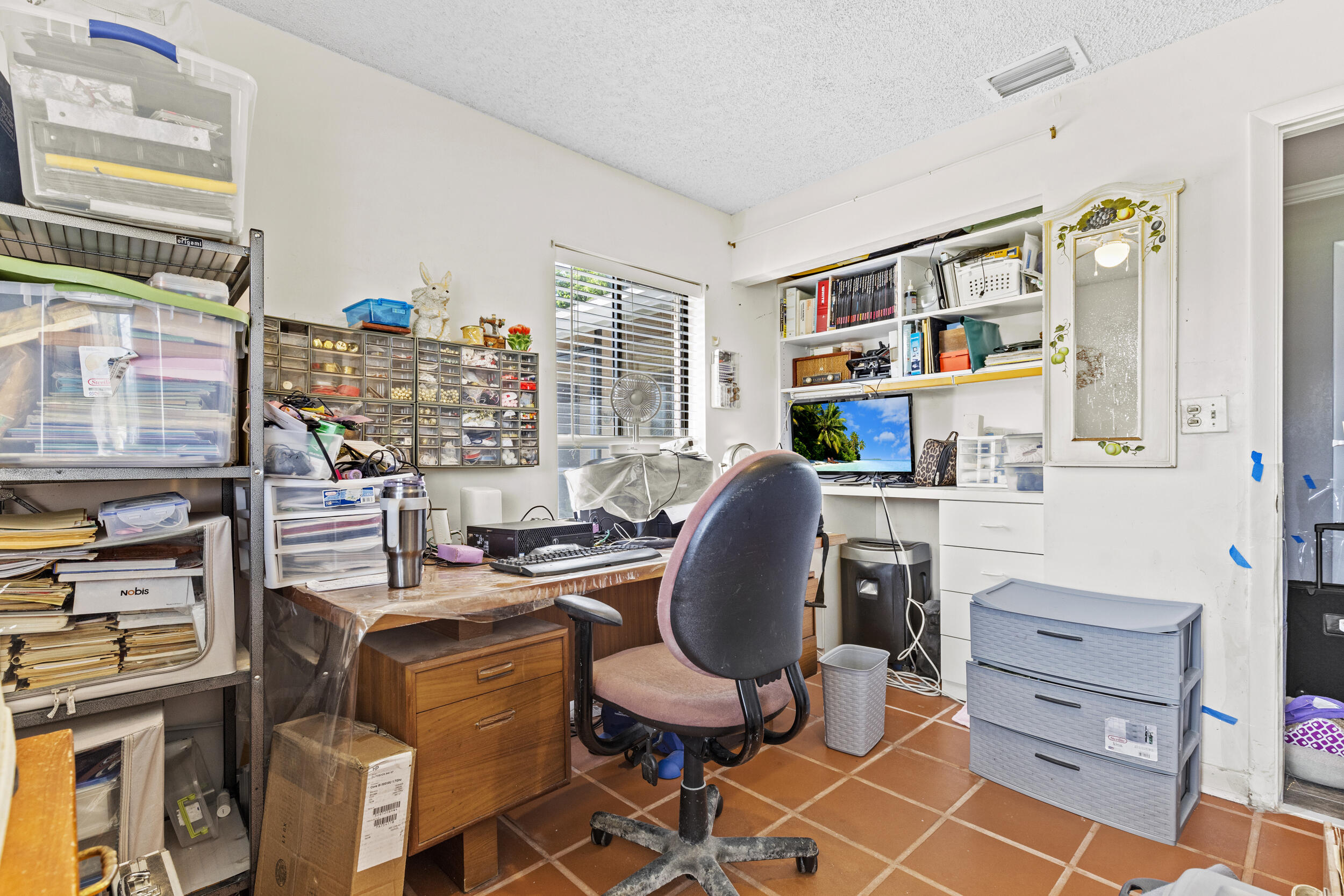 21665 Sutters Lane Boca Raton, FL 33428 - Photo 25 of 42 a view of a workspace with furniture and a window