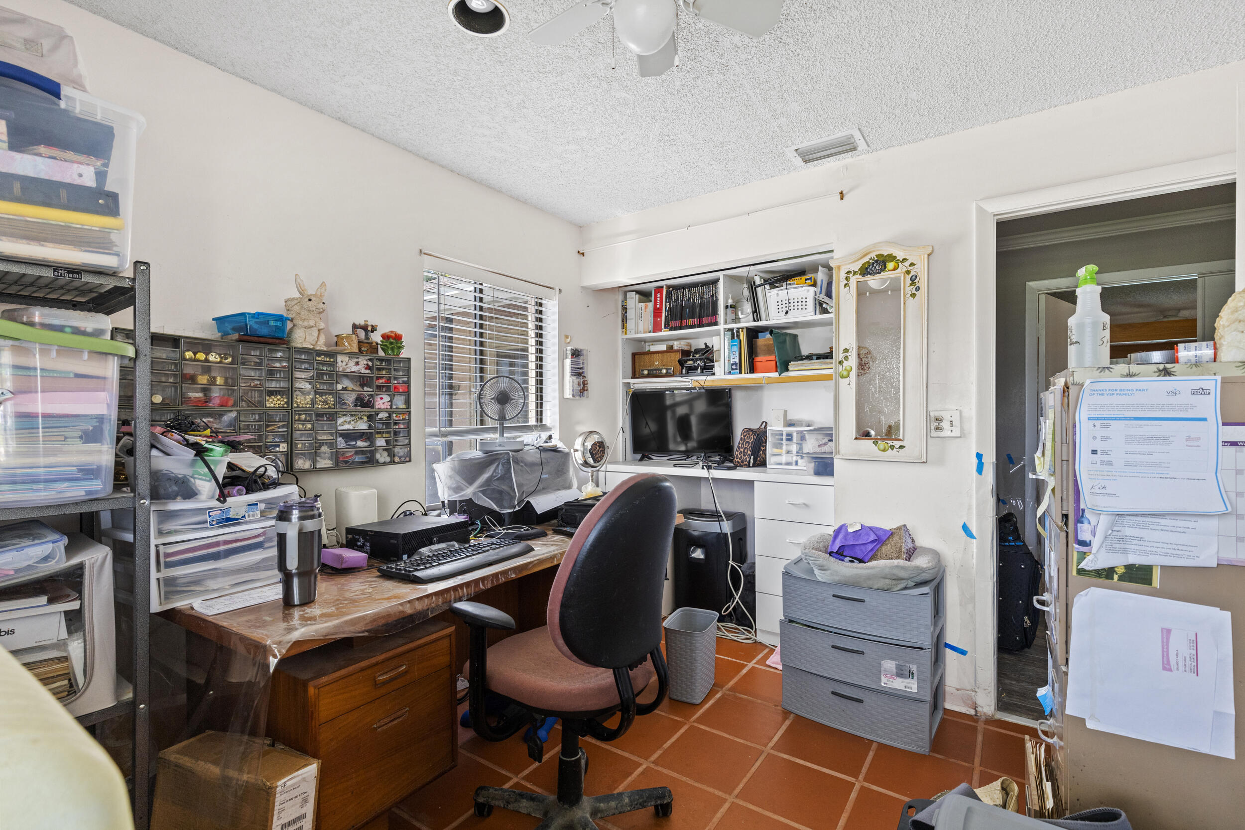 21665 Sutters Lane Boca Raton, FL 33428 - Photo 27 of 42 a room with furniture workspace and a window