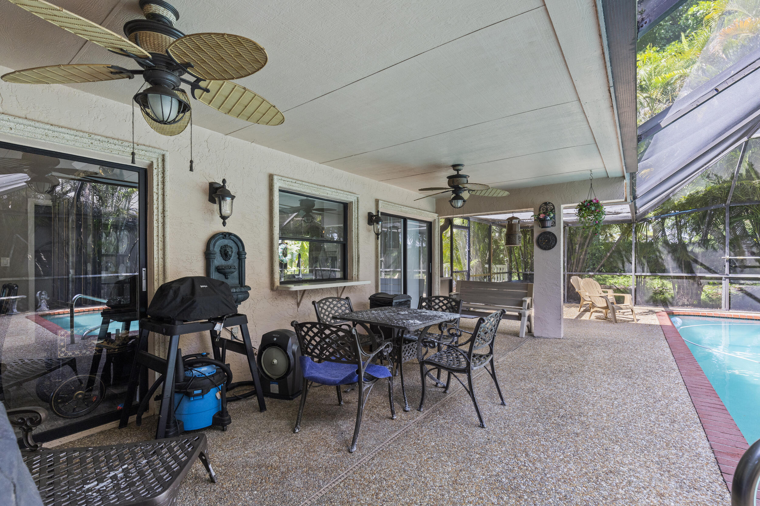 21665 Sutters Lane Boca Raton, FL 33428 - Photo 31 of 42 a view of a tables and chairs in patio