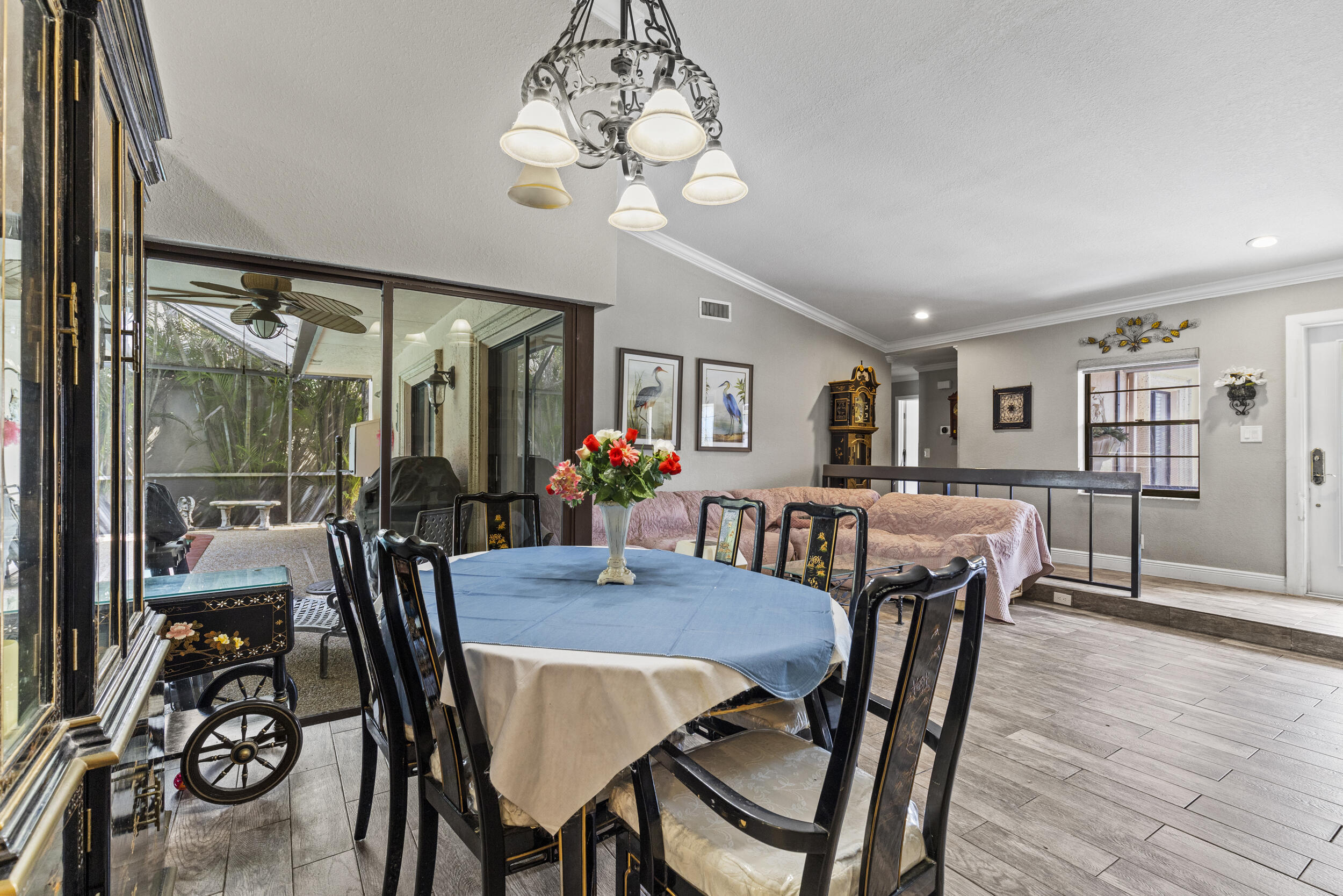 21665 Sutters Lane Boca Raton, FL 33428 - Photo 7 of 42 a view of a dining room with furniture window and wooden floor