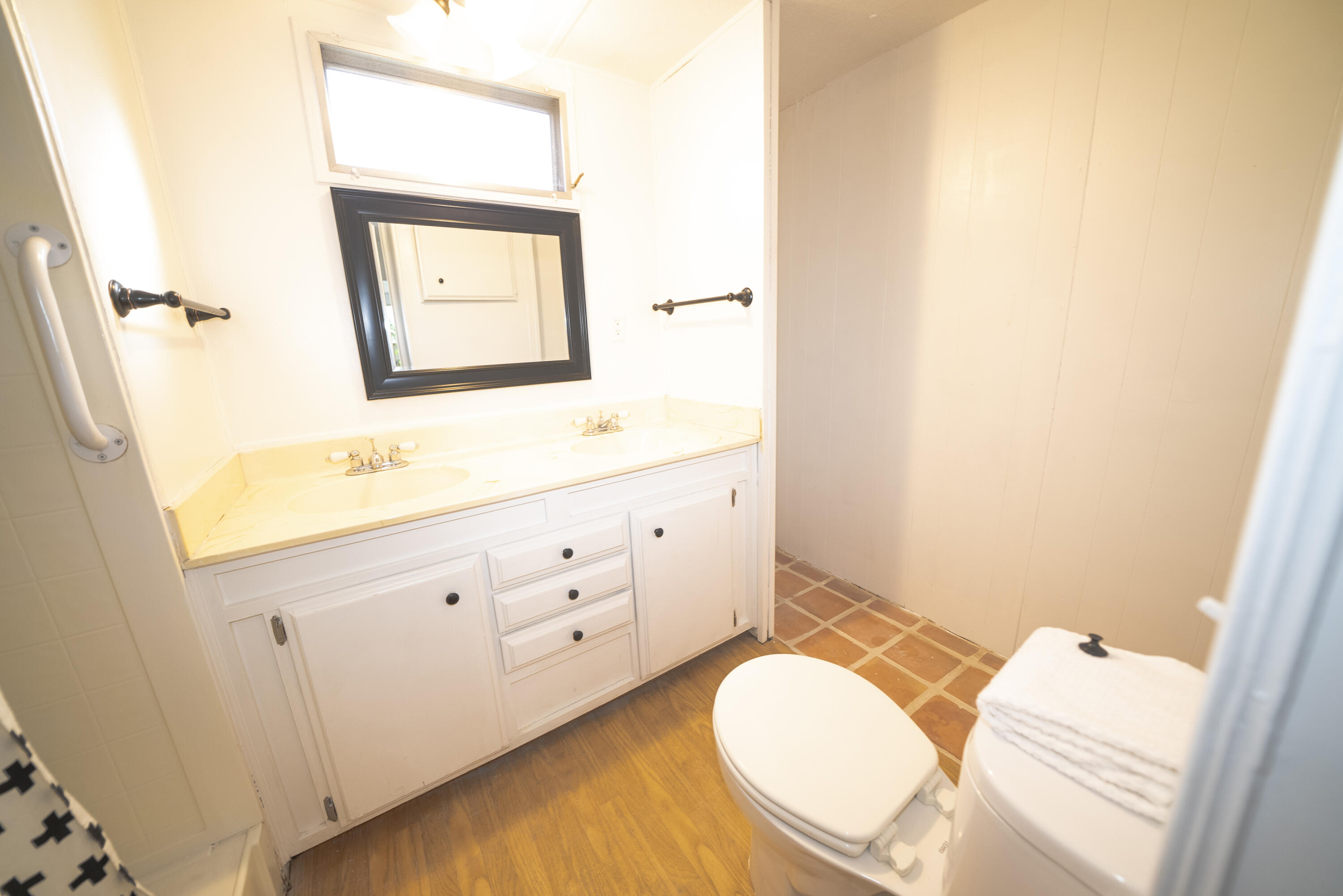 4025 State Street, Unit 26 Santa Barbara, CA 93110 - Photo 14 of 20 a bathroom with a sink mirror vanity and toilet