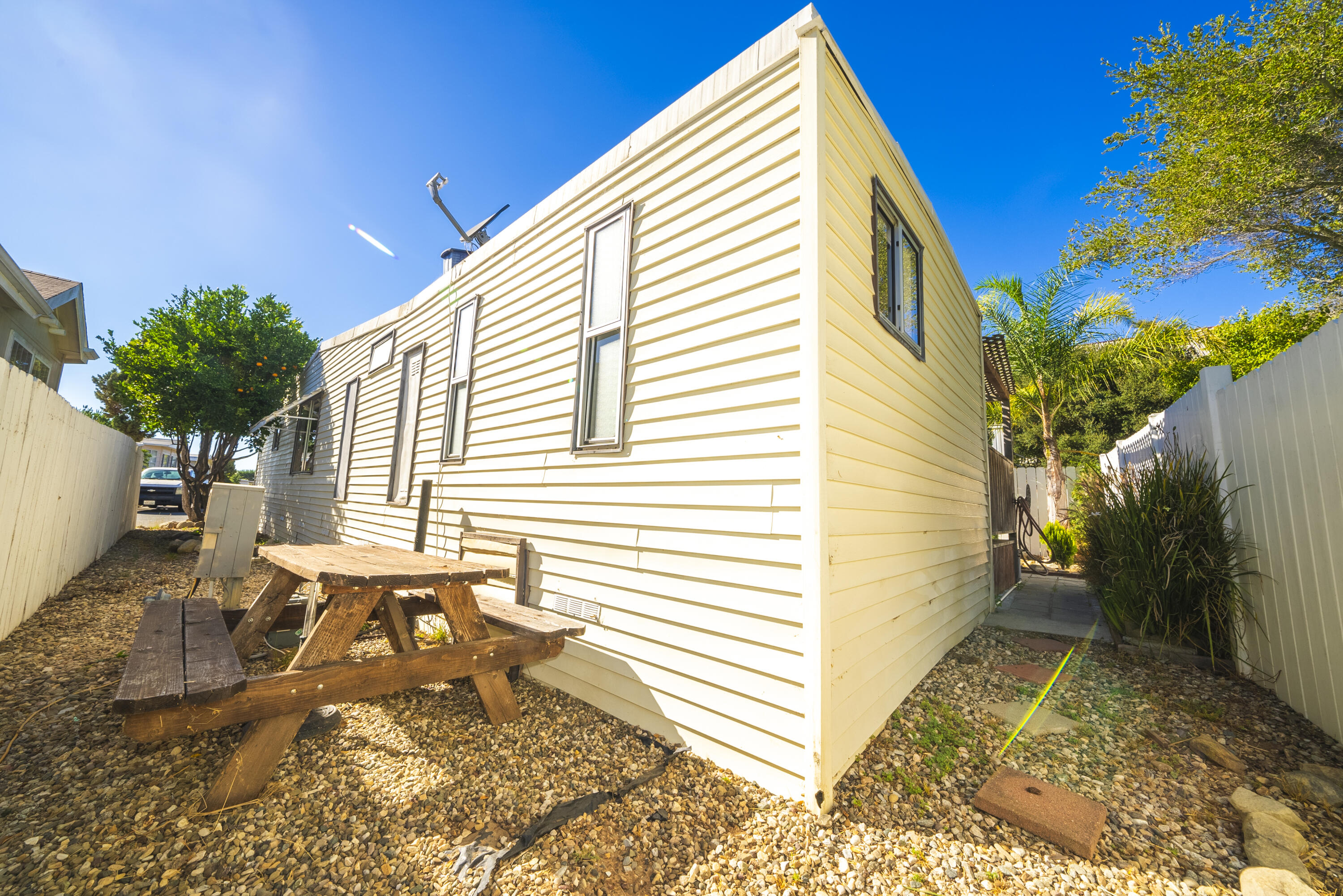 4025 State Street, Unit 26 Santa Barbara, CA 93110 - Photo 17 of 20 a view of a house with a backyard