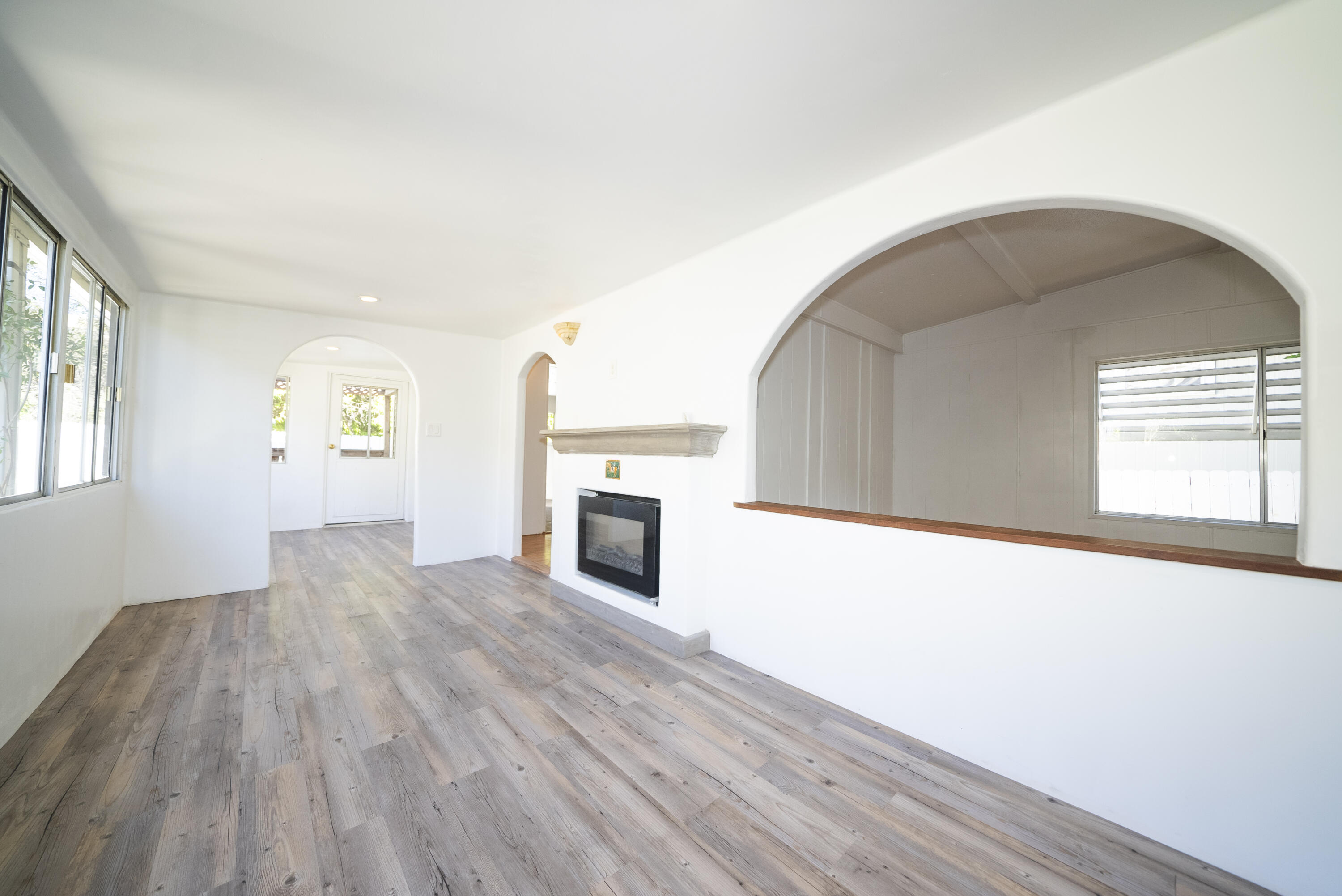 4025 State Street, Unit 26 Santa Barbara, CA 93110 - Photo 4 of 20 a view of empty room with wooden floor and fireplace