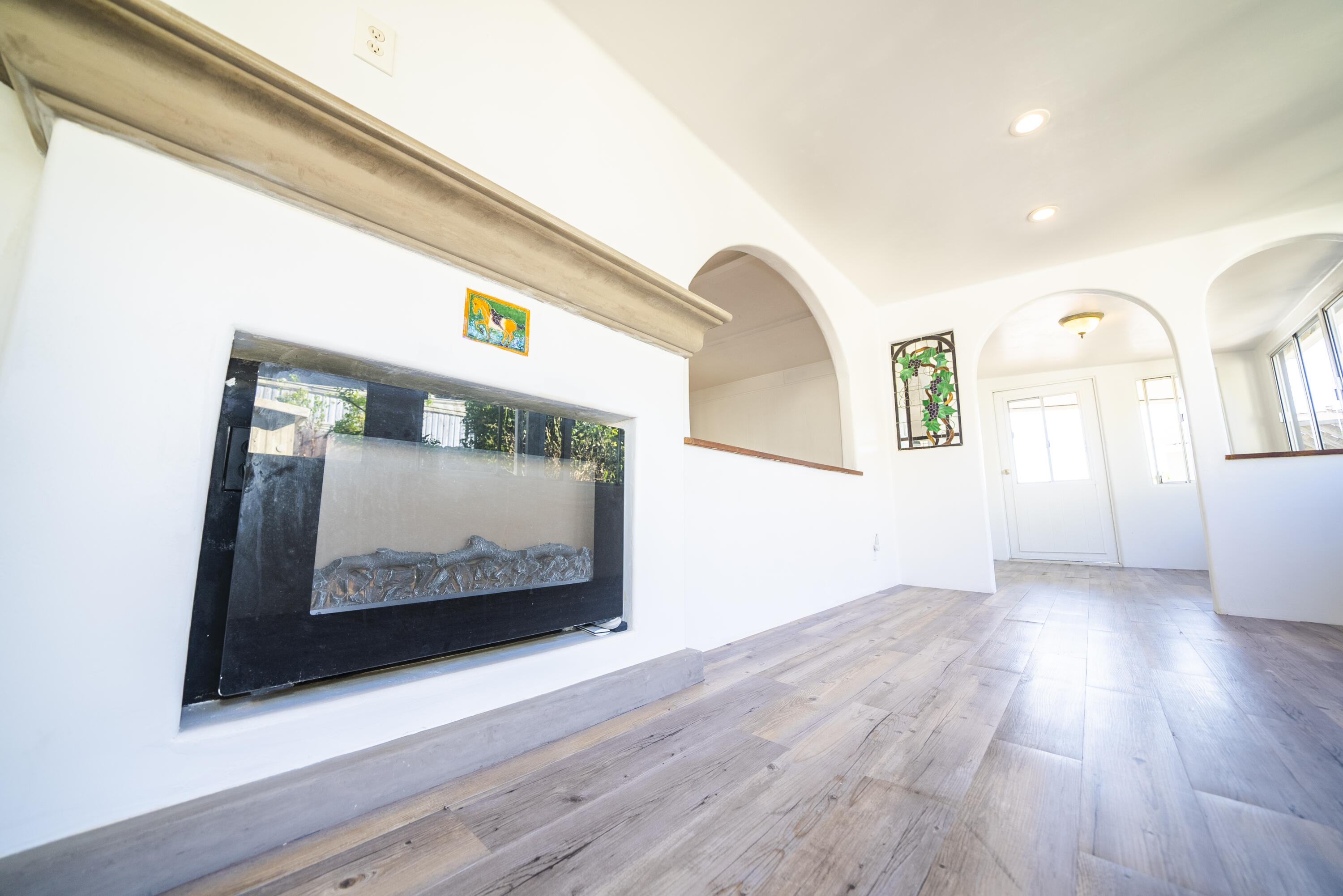 4025 State Street, Unit 26 Santa Barbara, CA 93110 - Photo 7 of 20 a view of a room with wooden floor and windows