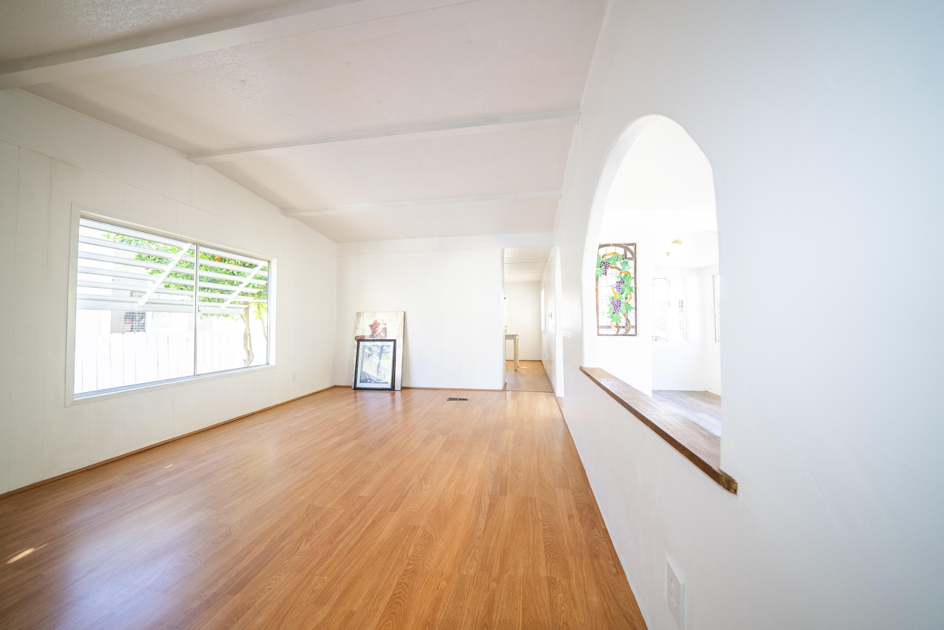4025 State Street, Unit 26 Santa Barbara, CA 93110 - Photo 10 of 20 wooden floor in an empty room with a window