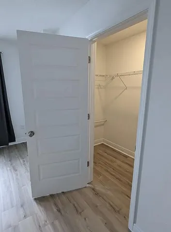 a bathroom with a sink double vanity and a mirror