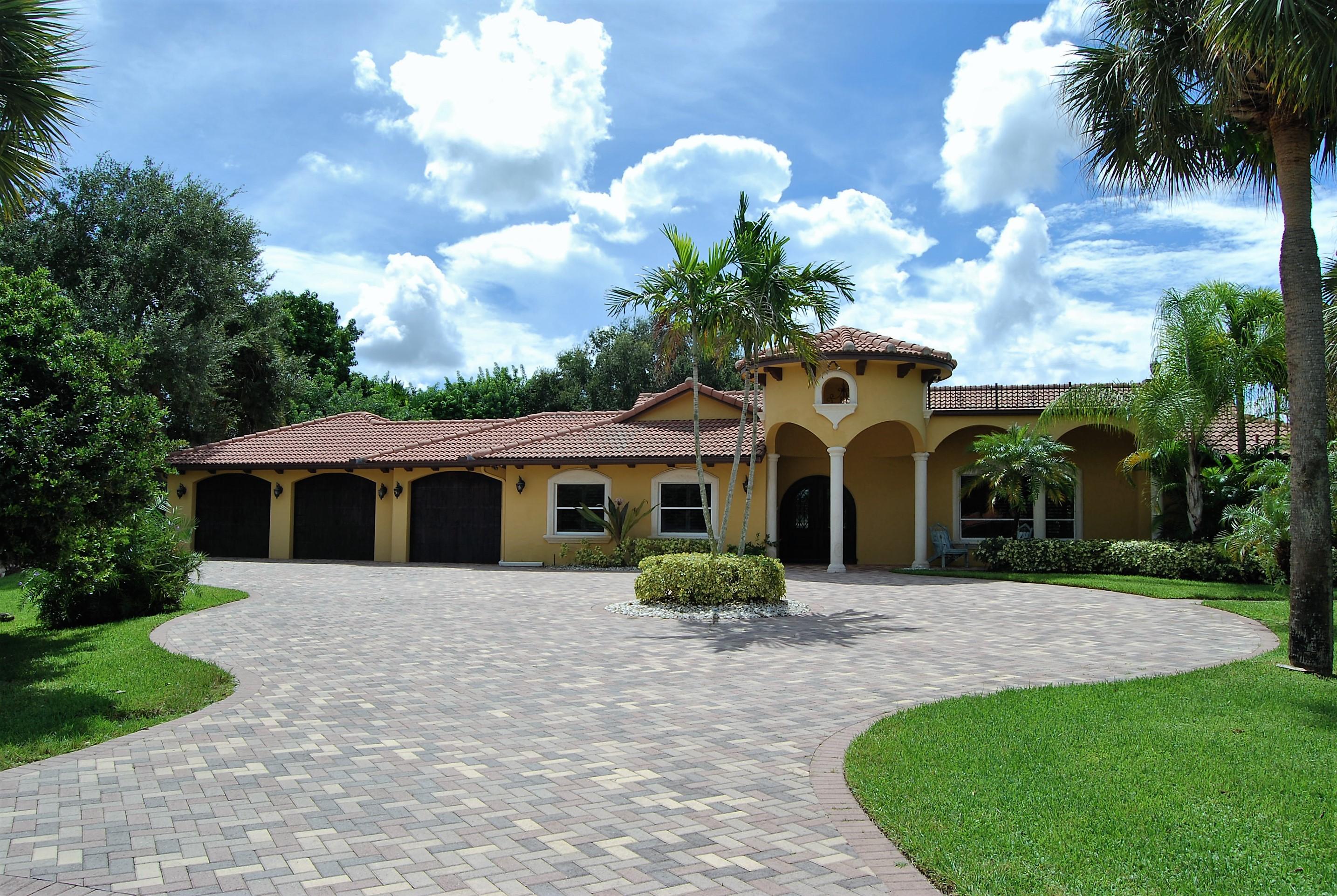 22828 Horseshoe Way Boca Raton, FL 33428 - Photo 1 of 52 Front of home - great curb appeal!