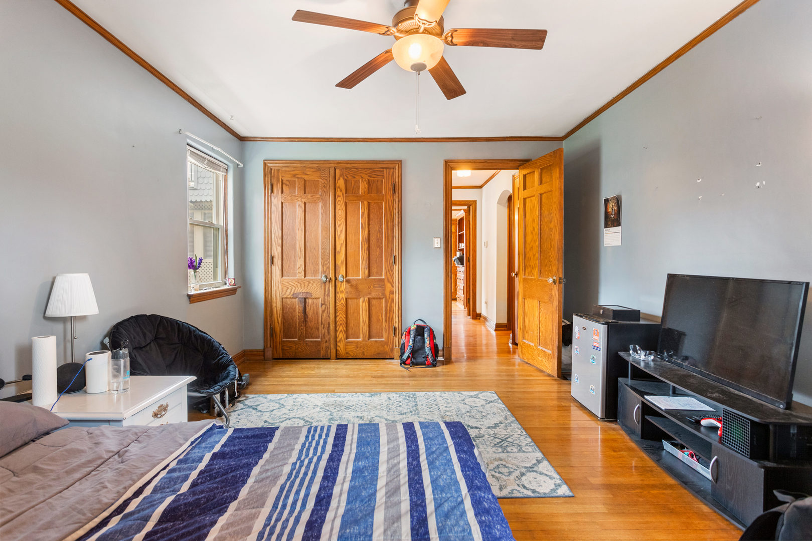 901 West Green Street Champaign, IL 61821 - Photo 18 of 36 a bedroom with furniture and a window
