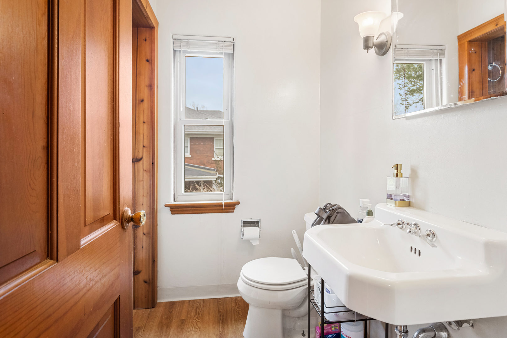 901 West Green Street Champaign, IL 61821 - Photo 28 of 36 a bathroom with a sink toilet and a mirror