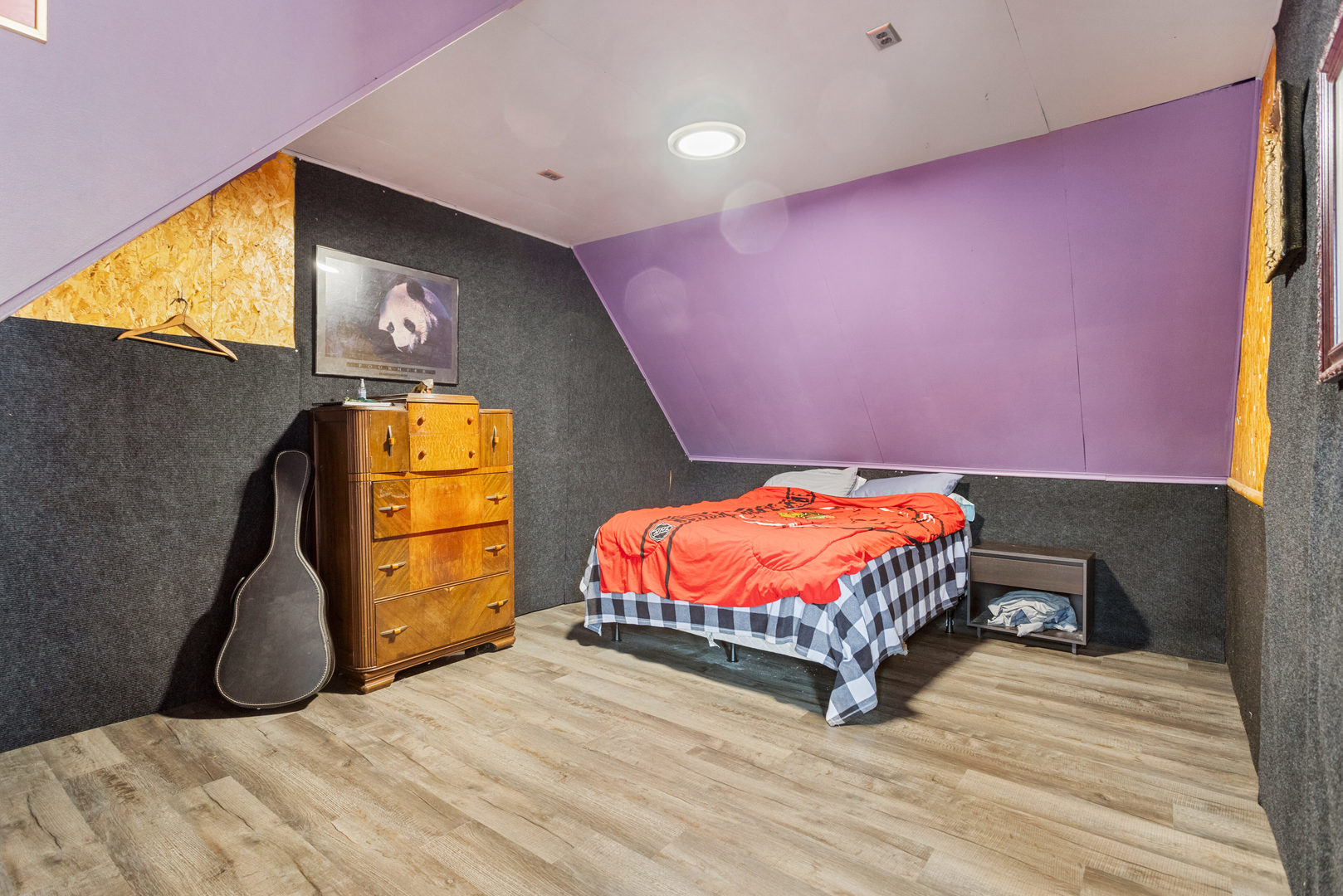 901 West Green Street Champaign, IL 61821 - Photo 31 of 36 a bedroom with a bed and a painting on the wall