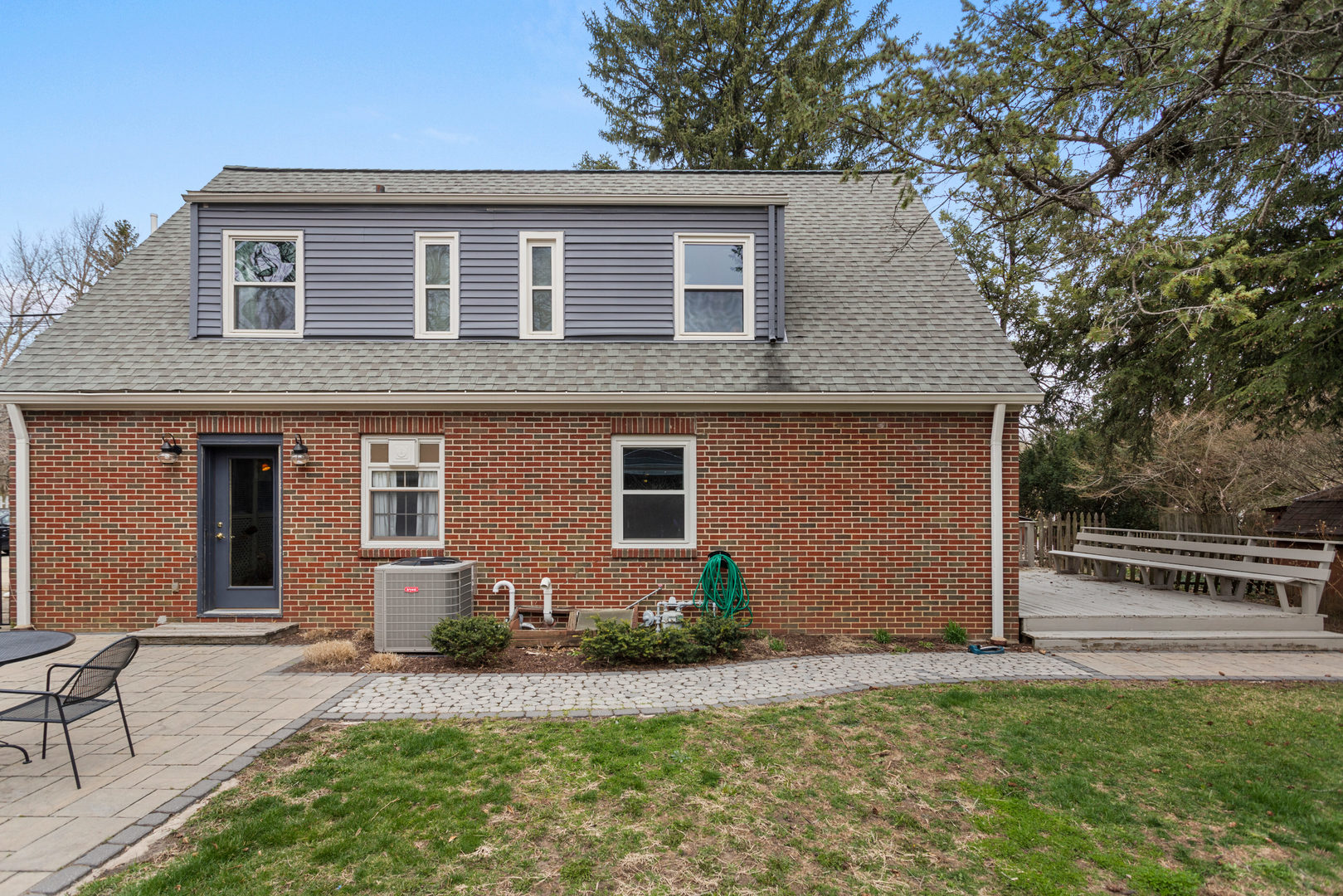 901 West Green Street Champaign, IL 61821 - Photo 4 of 36 a front view of house with yard and trees around