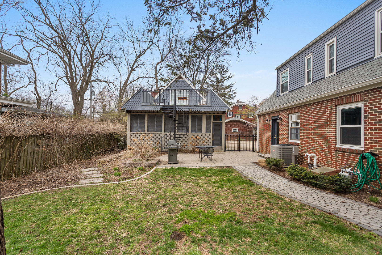 901 West Green Street Champaign, IL 61821 - Photo 5 of 36 a front view of a house with yard patio and green space