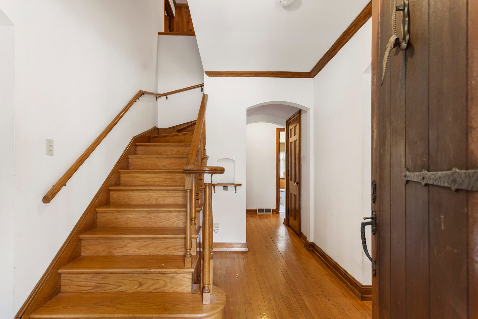 901 West Green Street Champaign, IL 61821 - Photo 8 of 36 a view of entryway and hall with wooden floor