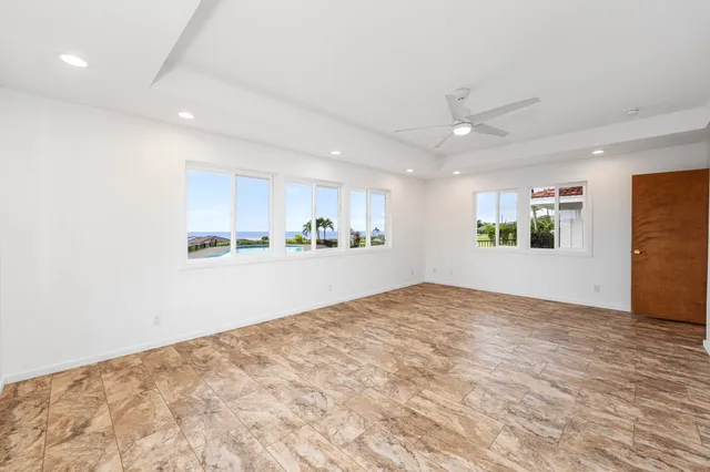 a view of a kitchen with a sink and a window