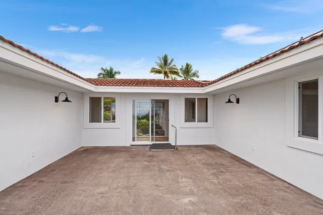 a front view of a house with a porch