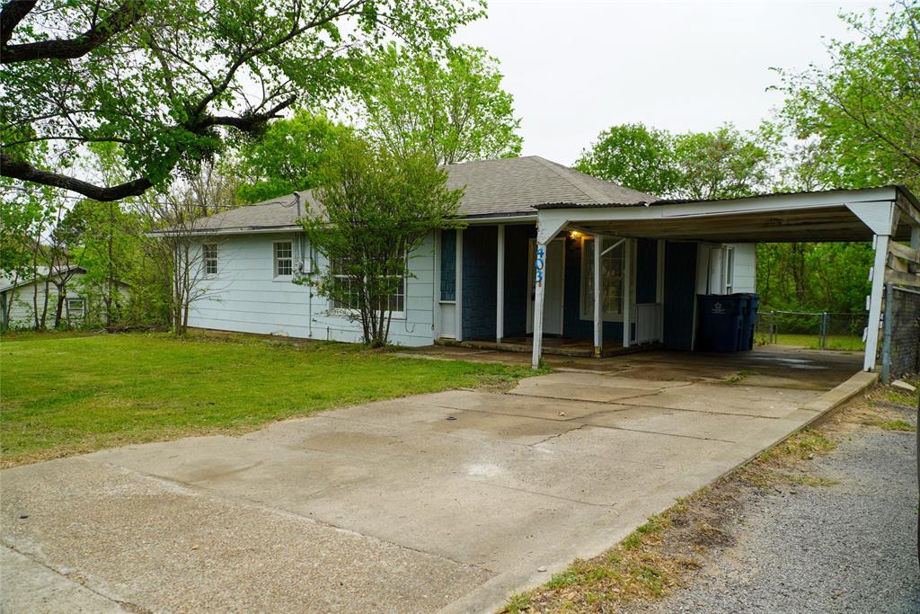 403 North Fairview Street Keene, TX 76059 - Photo 2 of 25 a view of a house with backyard and garden
