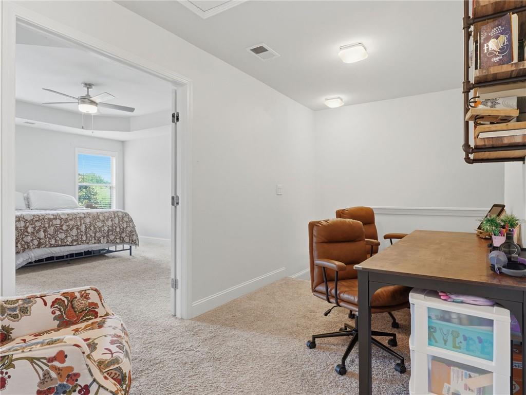 147 Fieldbrook Crossing Canton, GA 30115 - Photo 30 of 46 a workspace with furniture and a couch