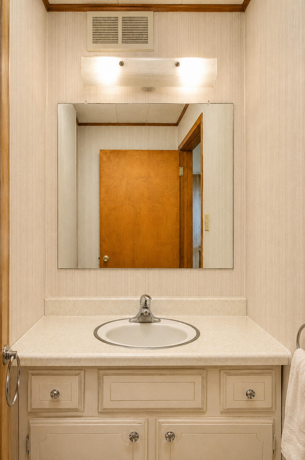 9502 Forrest Drive Highland, IN 46322 - Photo 20 of 27 a bathroom with a sink and a mirror