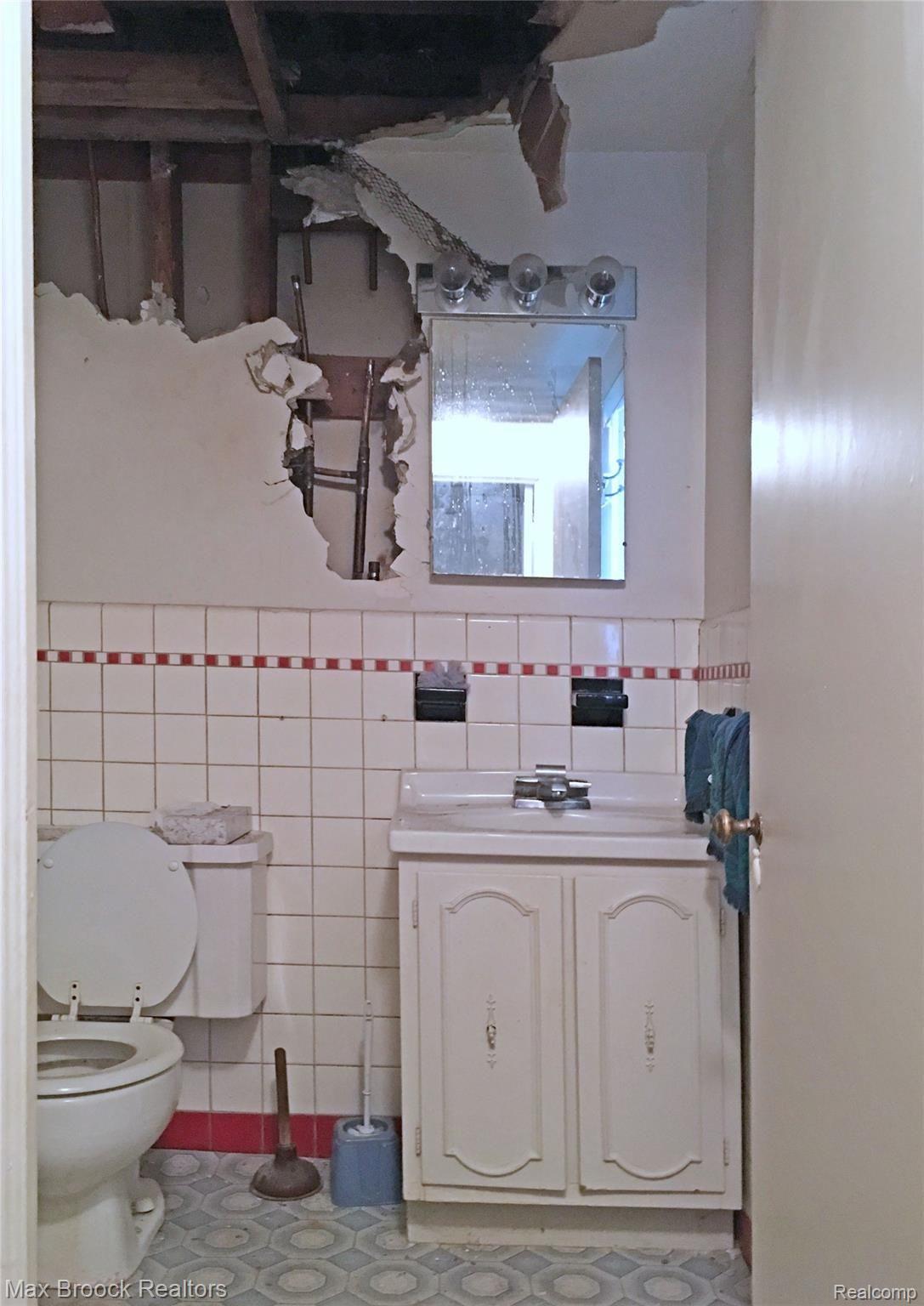 7411 West Seven Mile Road Detroit, MI 48221 - Photo 28 of 32 First Floor Lav Near Side Entrance