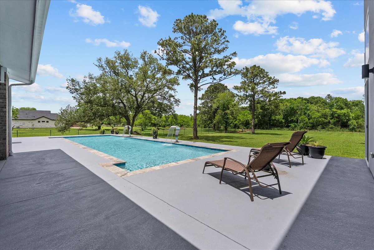 7627 Scott Avenue Manvel, TX 77578 - Photo 42 of 50 Perfect for sunbathing while looking out over your own 1.77-acre private sanctuary.