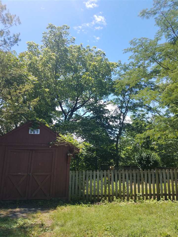 45 River Rdg Road Verona, VA 24482 - Photo 17 of 21 a backyard of a house with a garden and plants
