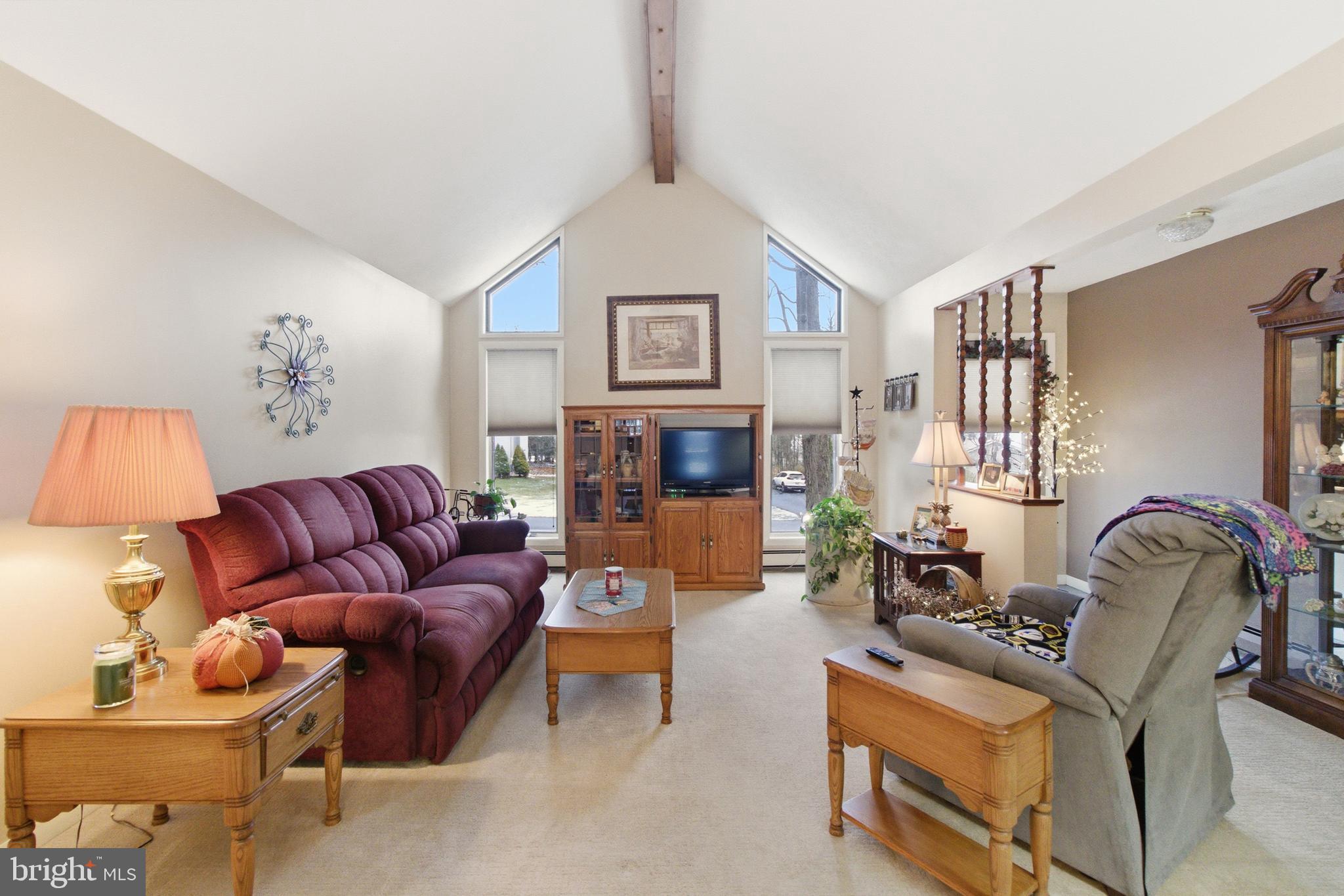 63 Sea Horse Road Du Bois, PA 15801 - Photo 15 of 35 a living room with furniture and a fireplace