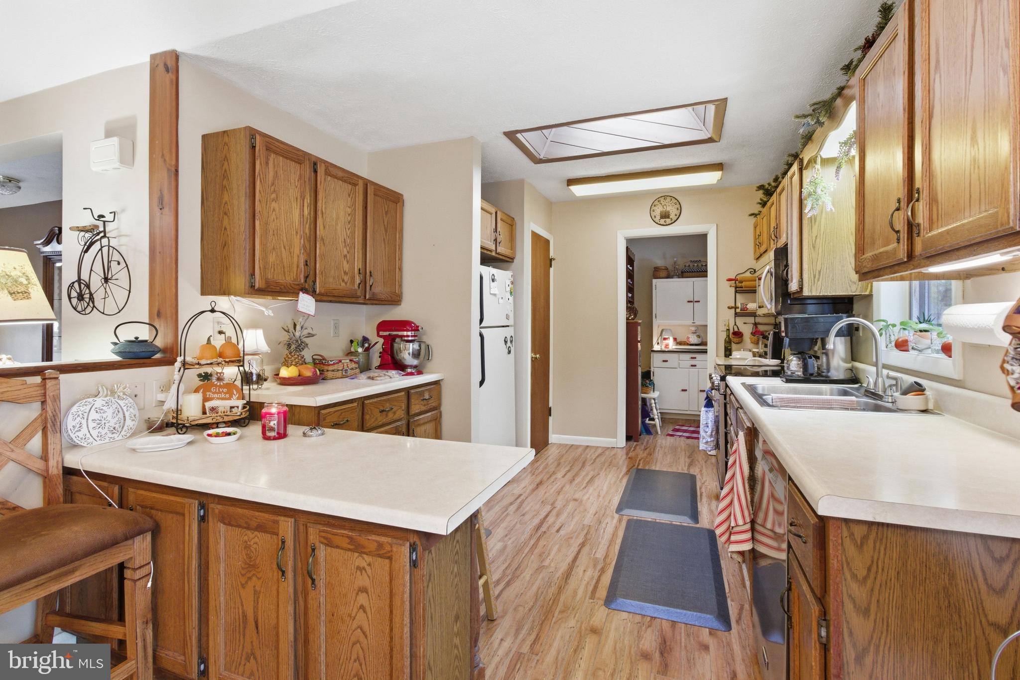 63 Sea Horse Road Du Bois, PA 15801 - Photo 19 of 35 a kitchen with stainless steel appliances a sink stove and refrigerator