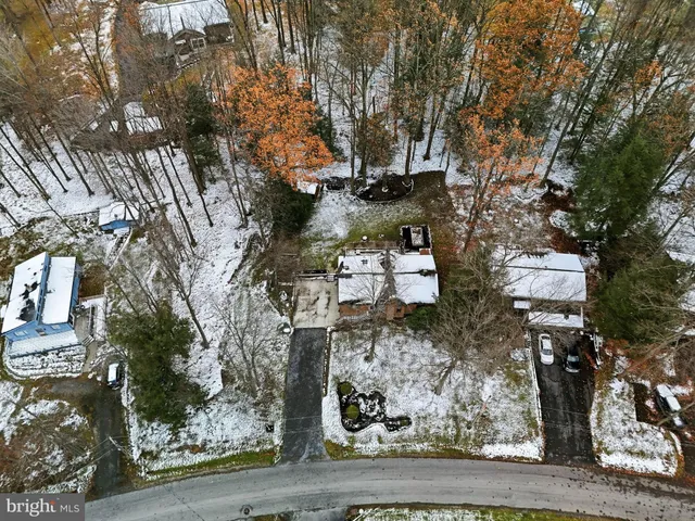 an aerial view of residential building with parking space