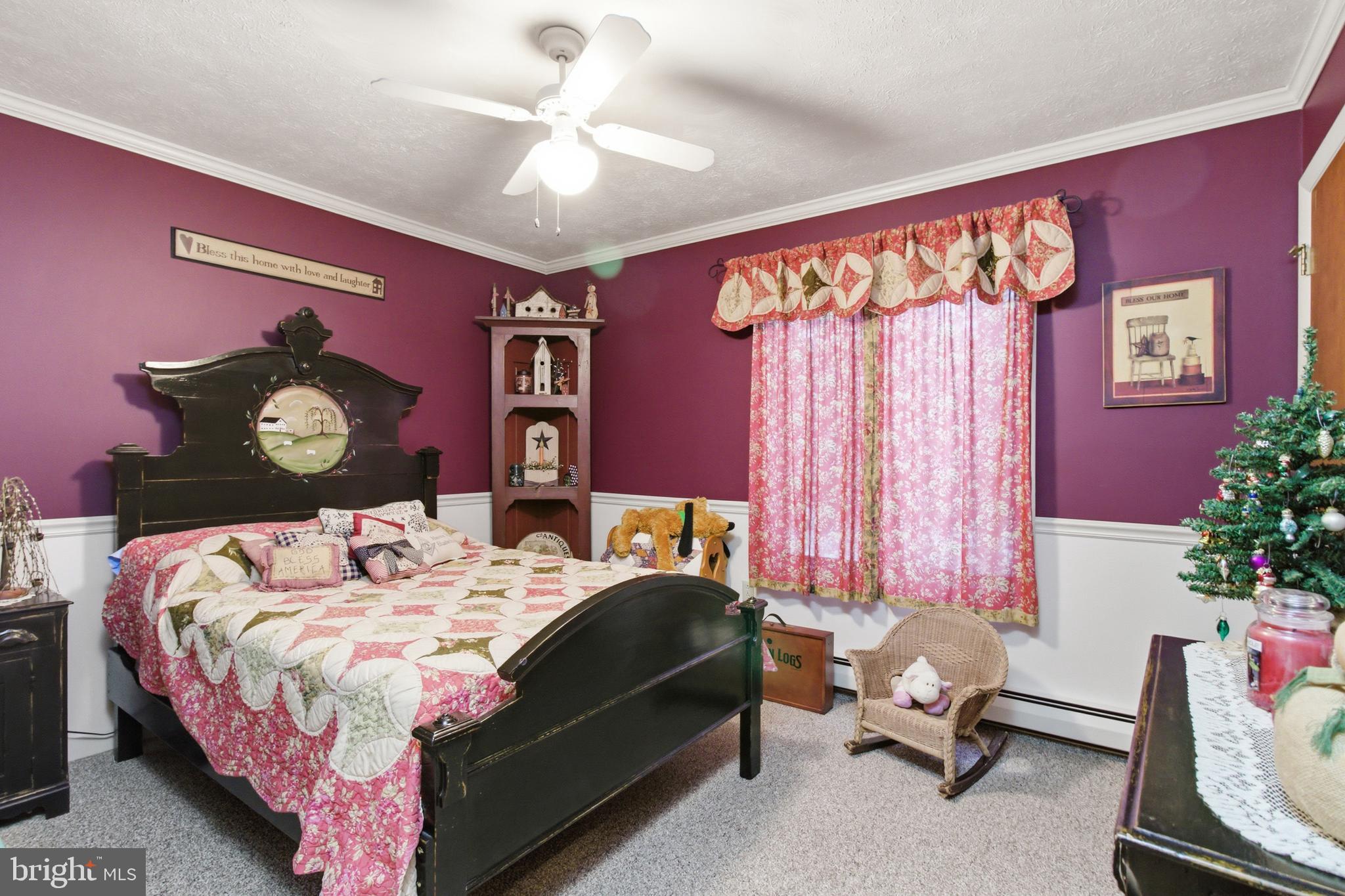 63 Sea Horse Road Du Bois, PA 15801 - Photo 29 of 35 a bedroom with a bed and a chandelier