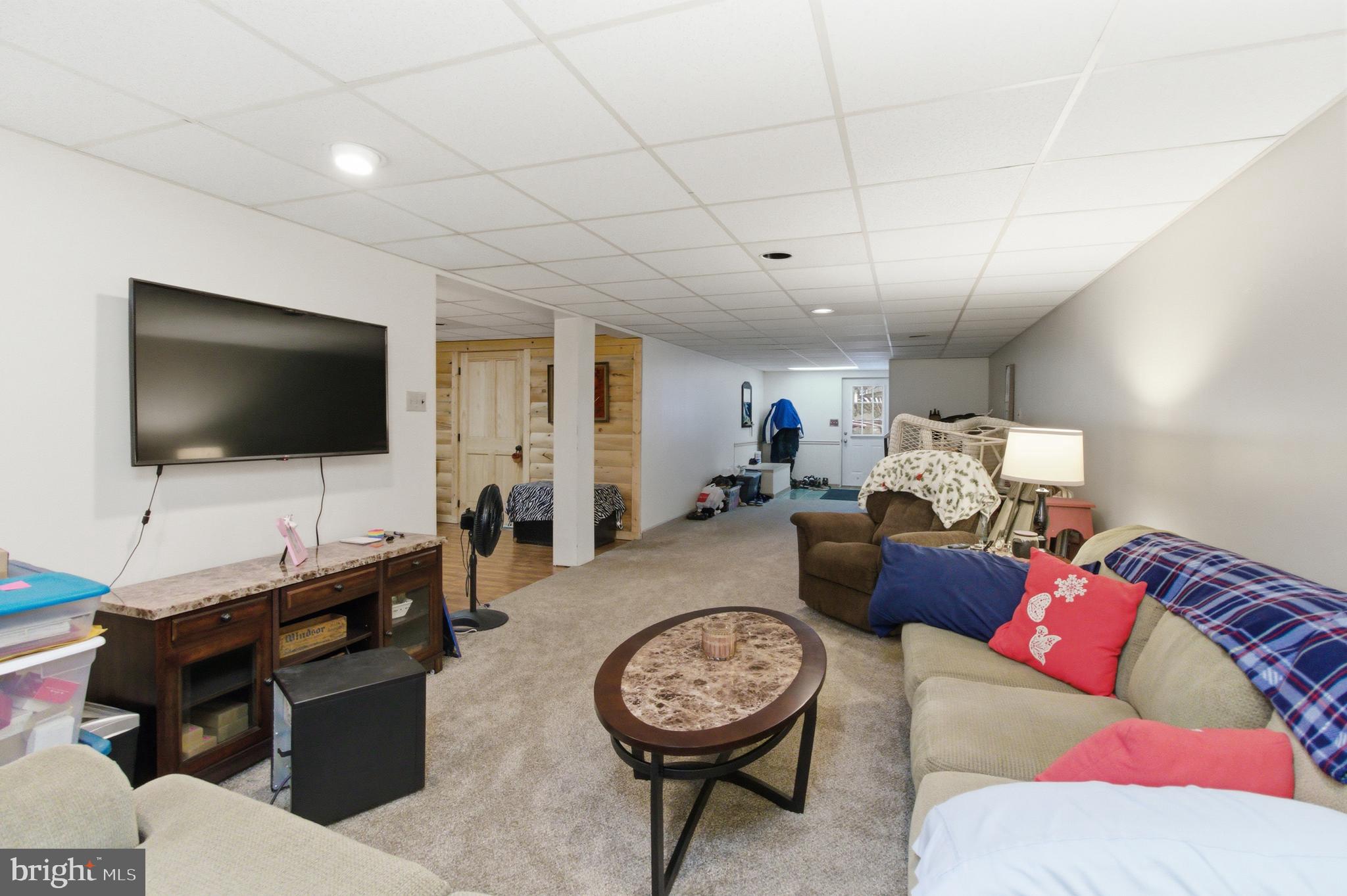 63 Sea Horse Road Du Bois, PA 15801 - Photo 33 of 35 a living room with furniture and a flat screen tv