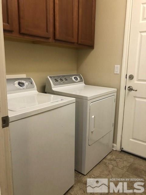8985 Convair Way Reno, NV 89506 - Photo 6 of 17 a utility room with dryer and washer