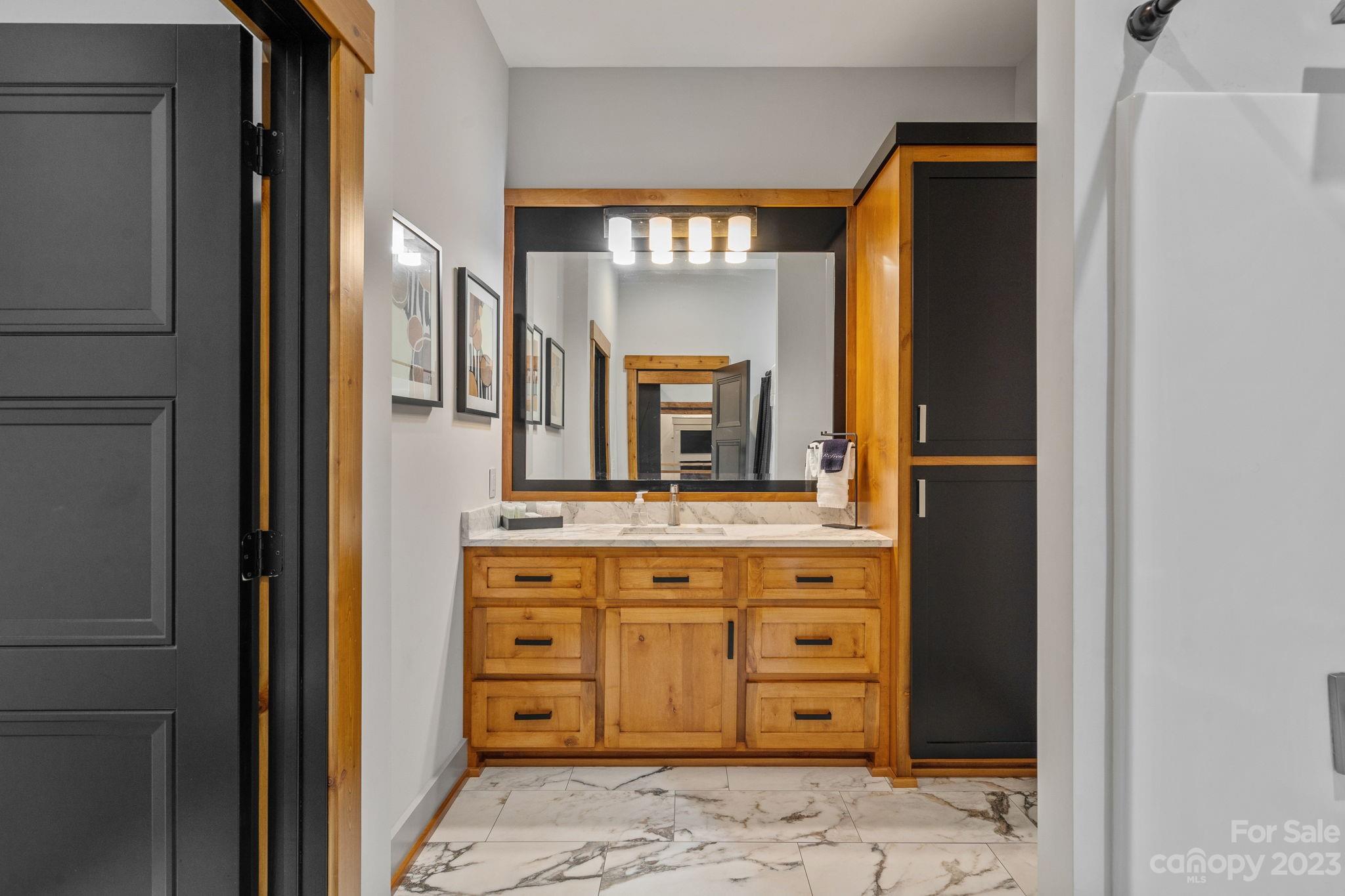 222 Greenbay Road Mooresville, NC 28117 - Photo 17 of 44 a bathroom with a sink and a mirror