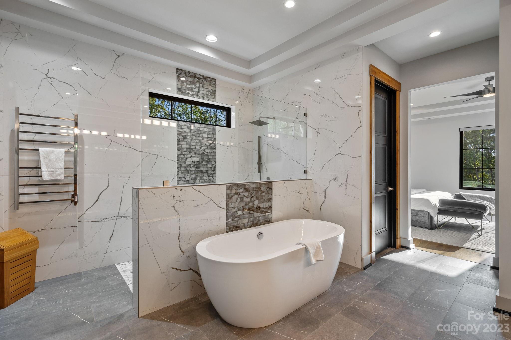 222 Greenbay Road Mooresville, NC 28117 - Photo 23 of 44 a bathroom with a bathtub and shower